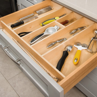 Open Drawer with Utensil Tray Holding Assorted Utensils | Canyon Creek Cabinet Company