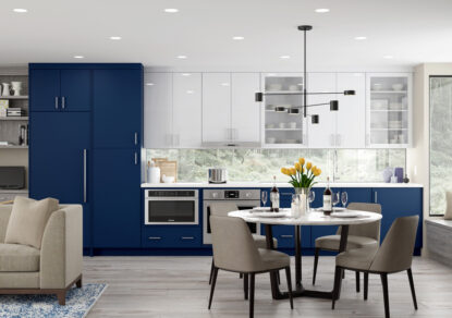 Open Kitchen Design with Blue High Gloss Acrylic and Foil Cabinets & Dining Table | Canyon Creek Cabinet Company